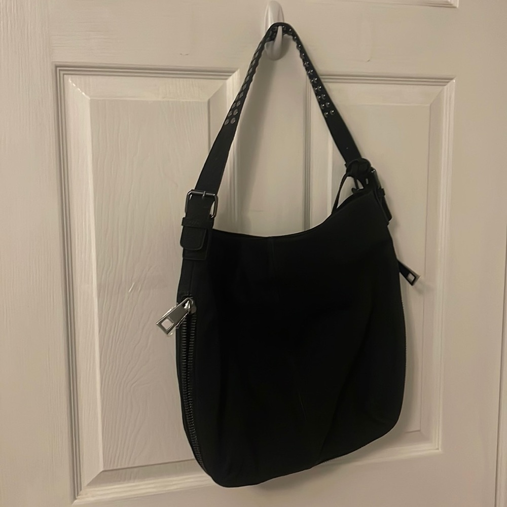 NWOT black rivet shoulder bag/tote.